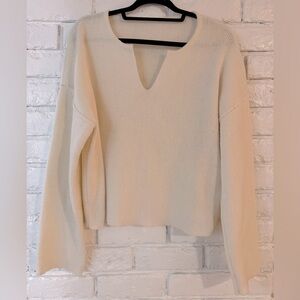 Bell sleeve winter white colored sweater with split neck , L